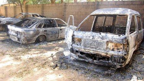 Burnt vehicles at a church compound in Nigeria's north-eastern town of Damaturu (picture taken on 8 November)