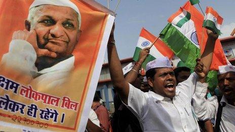 Supporters of Indian rights activist Anna Hazare shout slogans during a rally in support of Mr Hazare's fight against corruption, in Mumbai, Aug 2011