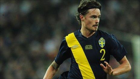 Mikael Lustig in action for Sweden