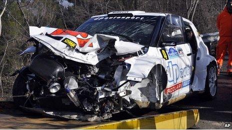 The wrecked rally car of F1 driver Robert Kubica