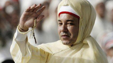 King Mohammed VI of Morocco waves to crowds during Throne Day Celebrations at the Royal Palace on 31 July, 2006 in Rabat, Morocco