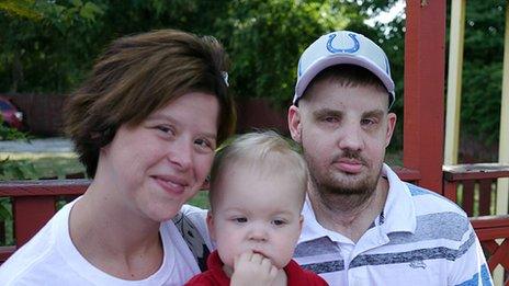 Mitch Hunter with his partner and son