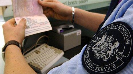 A passport being checked at an airport