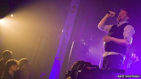 Guy Garvey performing at Manchester Cathedral