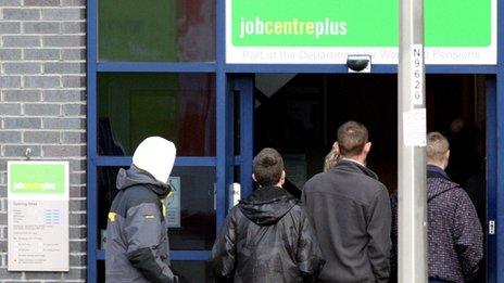 Young men enter a Job Centre