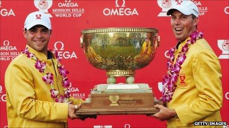 Gary Woodland and Matt Kuchar with the World Cup trophy