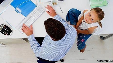 Girl at work with her father