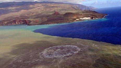 Undersea eruption discolours the water