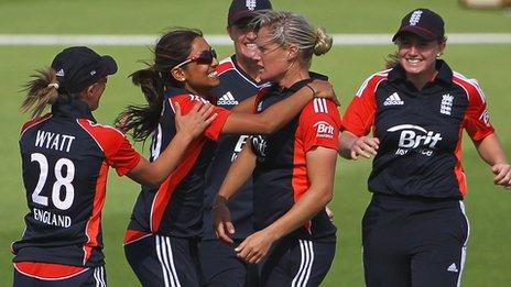 Katherine Brunt (second right) is congratulated after taking a wicket