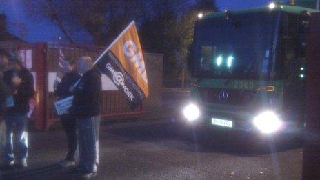 GMB members stand in front of a bin lorry in Perry Barr