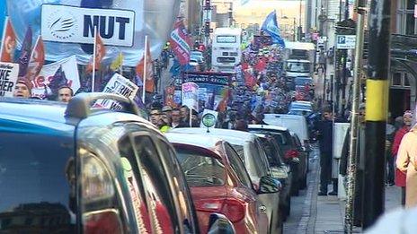 Protesters marching through Birmingham to a pensions rally