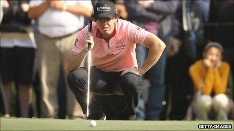 Rory McIlroy lines up a putt during the second round in Hong Kong