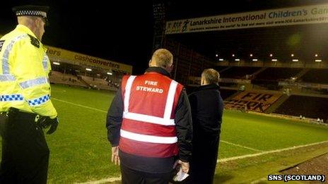 Police and stewards at Fir Park