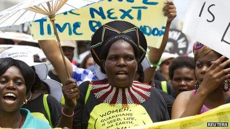 Climate change protesters march in Durban, 3 December 2011