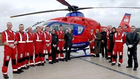 Judi and the Air Ambulance team in front of one of the aircraft
