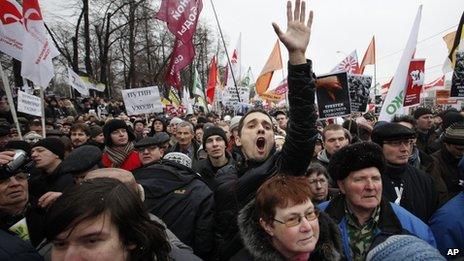 Protesters shout anti-Putin slogans during a mass rally to protest against alleged vote rigging in Russia's parliamentary elections in Moscow, Russia