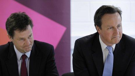 File photograph of Nick Clegg and David Cameron on 12 May 2011