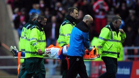 Ryan Lowe is stretchered off