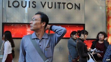 Chinese tourists outside a Louis Vuitton store in Hong Kong