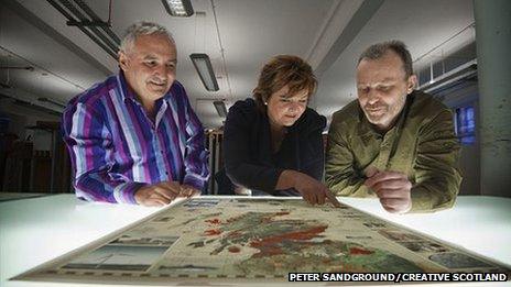 Andrew Dixon from Creative Scotland with Culture Secretary Fiona Hyslop and artist Murray Robertson