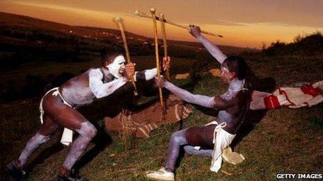 Xhosa boys practise traditional spear fighting