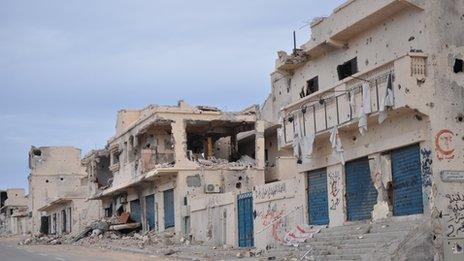 Damaged buildings in Sirte