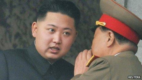 Kim Jong-un (left), the youngest son of late North Korean leader Kim Jong-il, with an official during the 65th anniversary of the founding of the Workers' Party of Korea in Pyongyang on 10 October 2010