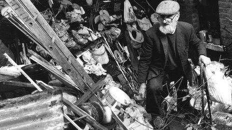 Edmund Trebus in his rubbish-strewn back garden in north London