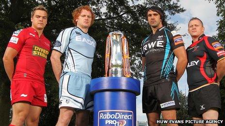 Representatives from the four Welsh regions with the Pro12 trophy