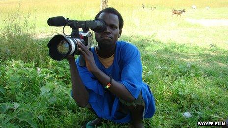 A Woyee member filming