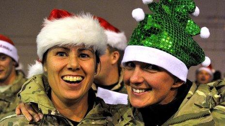 Troops holding a carol service at Camp Bastion, Afghanistan