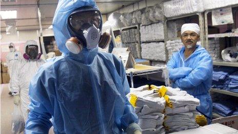 Workers at the Fukushima Dai-ichi nuclear plant