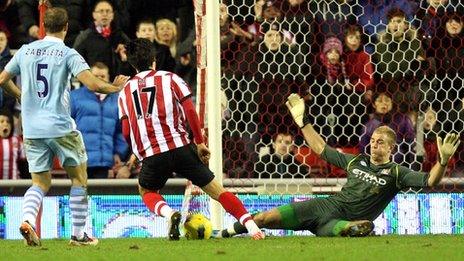 Ji Dong-won rounds Joe Hart to score