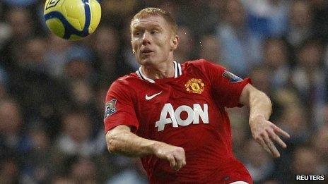 Paul Scholes in action against Manchester City