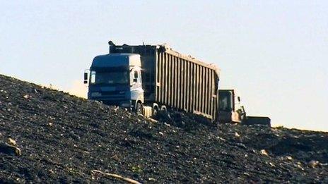 Lorry driving up to rubbish tip