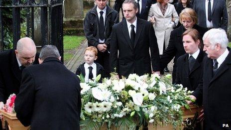 The family of Kerry McGregor, including her son Joshua and partner Dean Robertson at her funeral