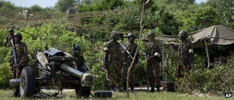 Kenyan army soldiers are seen in their base near the seaside town of Bur Garbo, Somalia Wednesday, Dec. 14, 2011.