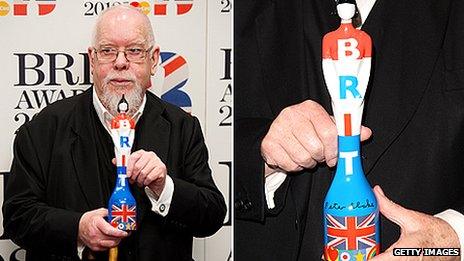 Sir Peter Blake holds his design for the 2012 Brit Award