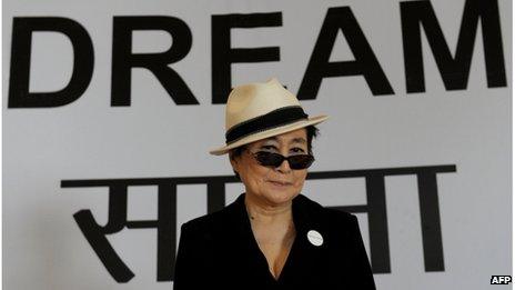 Yoko Ono, poses for photographers during a press conference in New Delhi on January 11, 2012.