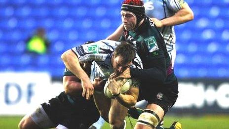 Cardiff Blues' Sam Warburton is tackled by London Irish's Nick Kennedy