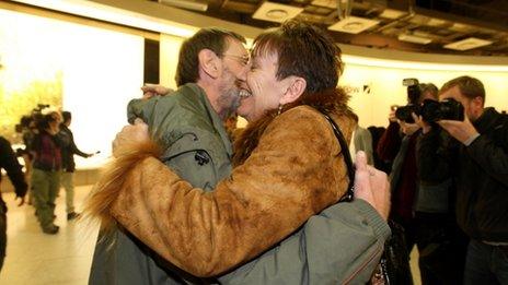 Passenger Brian Page greeted by his sister