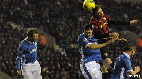 Edin Dzeko scores for Manchester City