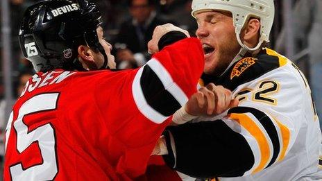 Shawn Thornton of the Boston Bruins and Cam Janssen of the New Jersey Devils