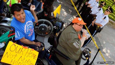 Activists protest against cuts To long-term health care in Washington DC