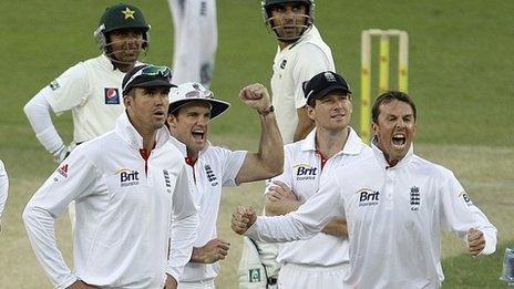 England celebrate the late wicket of Graeme Swann