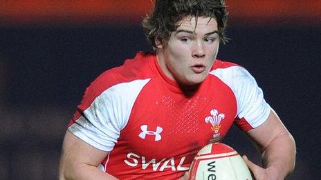 Harry Robinson playing for Wales U20