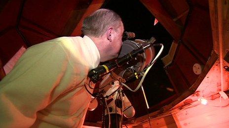 Brian Lynn in his homemade observatory