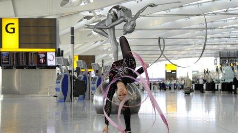 Frankie Jones and the sculpture at Heathrow