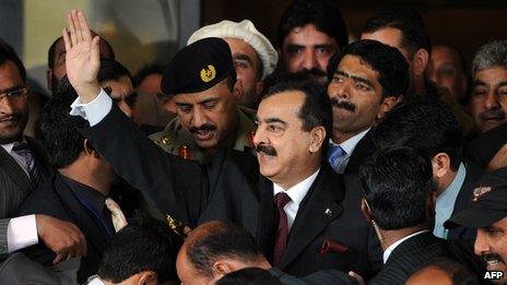 Pakistan's Prime Minister Yousuf Raza Gilani leaving the supreme court