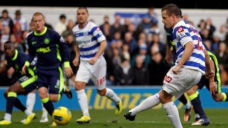 QPR striker Heidar Helguson opens the scoring against Wigan